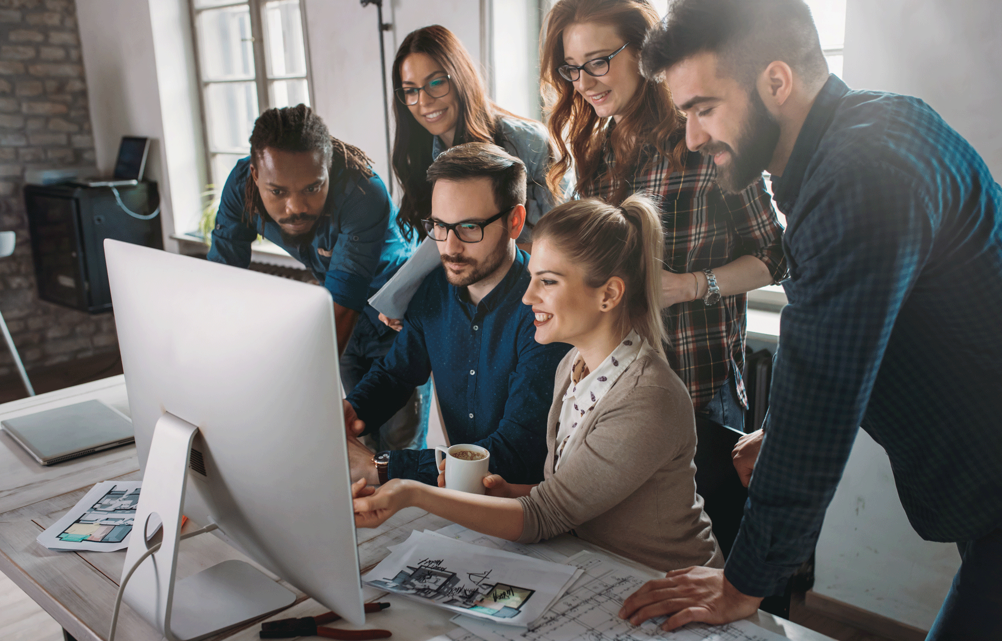 Ororasoft Team Working Together